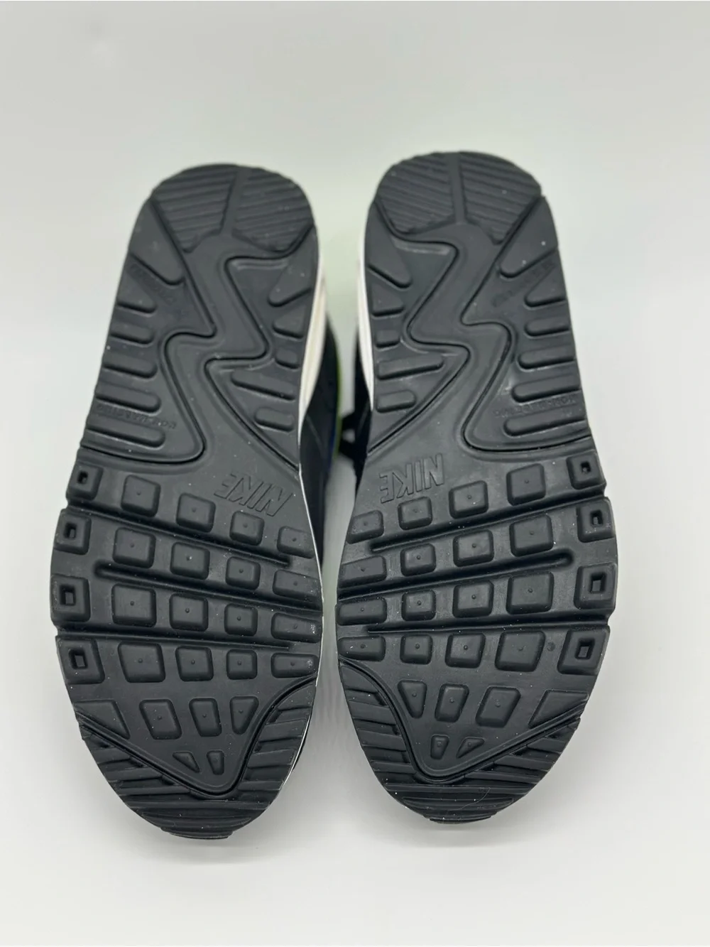 Nike Kids Black Sneakers with Neon Yellow and Blue Swoosh